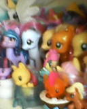 a collection of my little pony toys