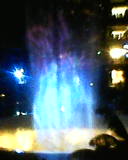 a fountain with a blue light
