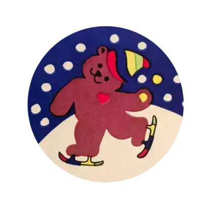 a colourfully dressed bear having fun iceskating on a snowy night