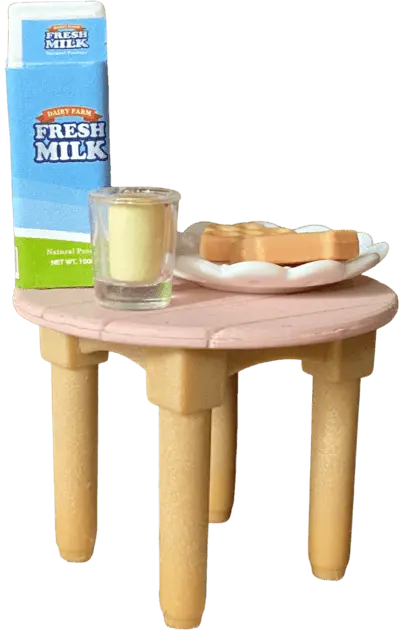a table with milk and cookies